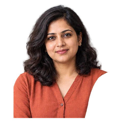 Fictional editorial persona · AI-generated portrait — Nisha Kapoor